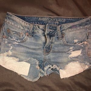 Light blue distressed jean shorts.